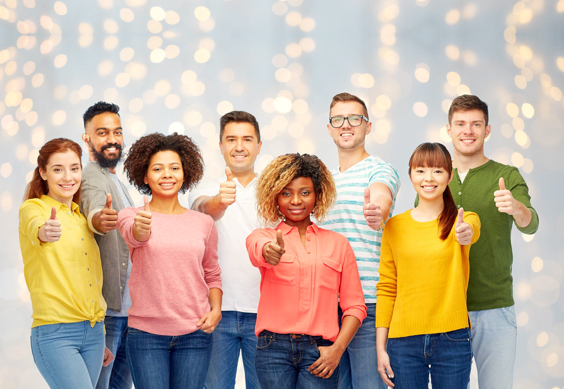 group of people having thumbs up